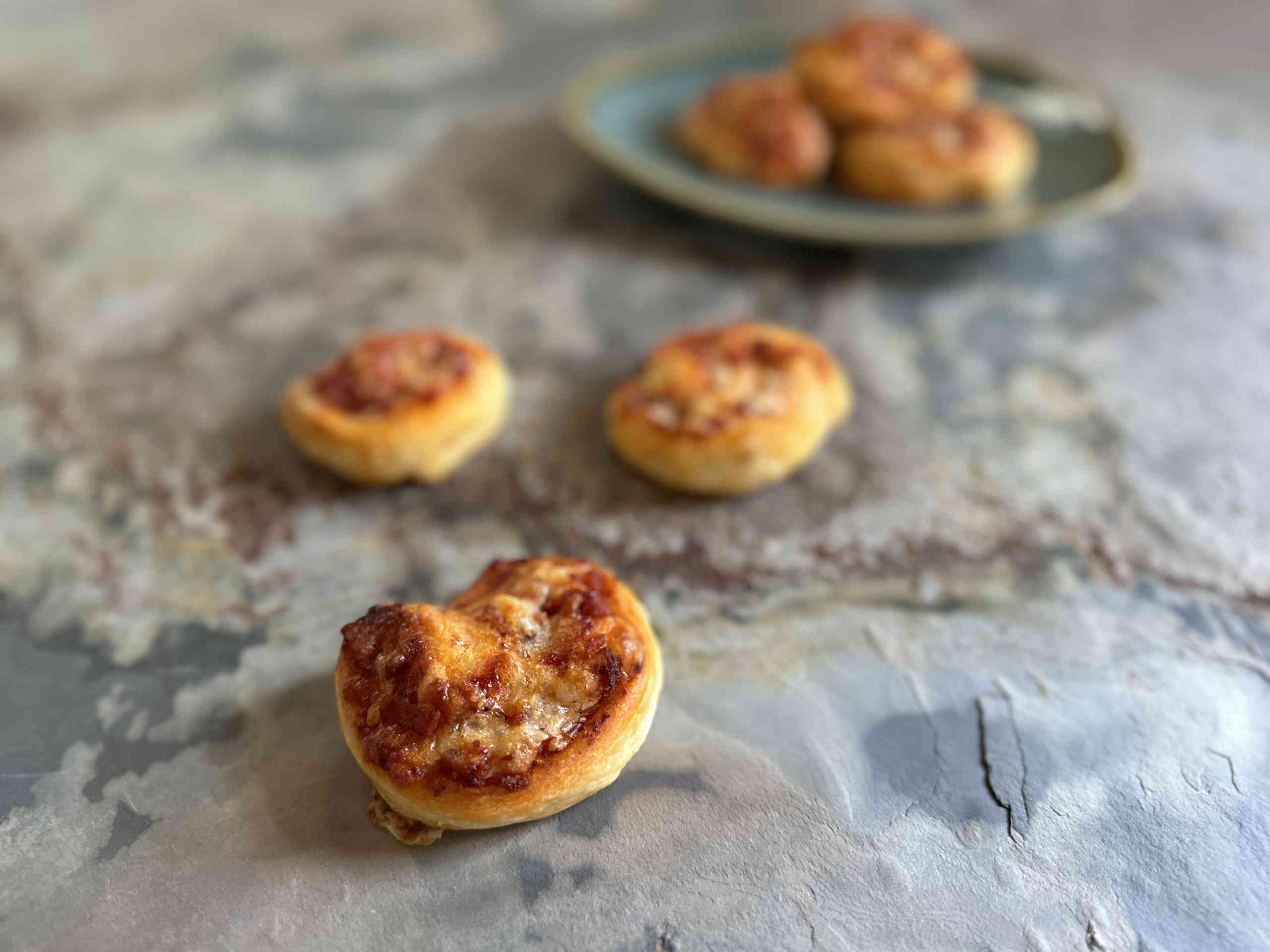 Puff pastry snails pizza style