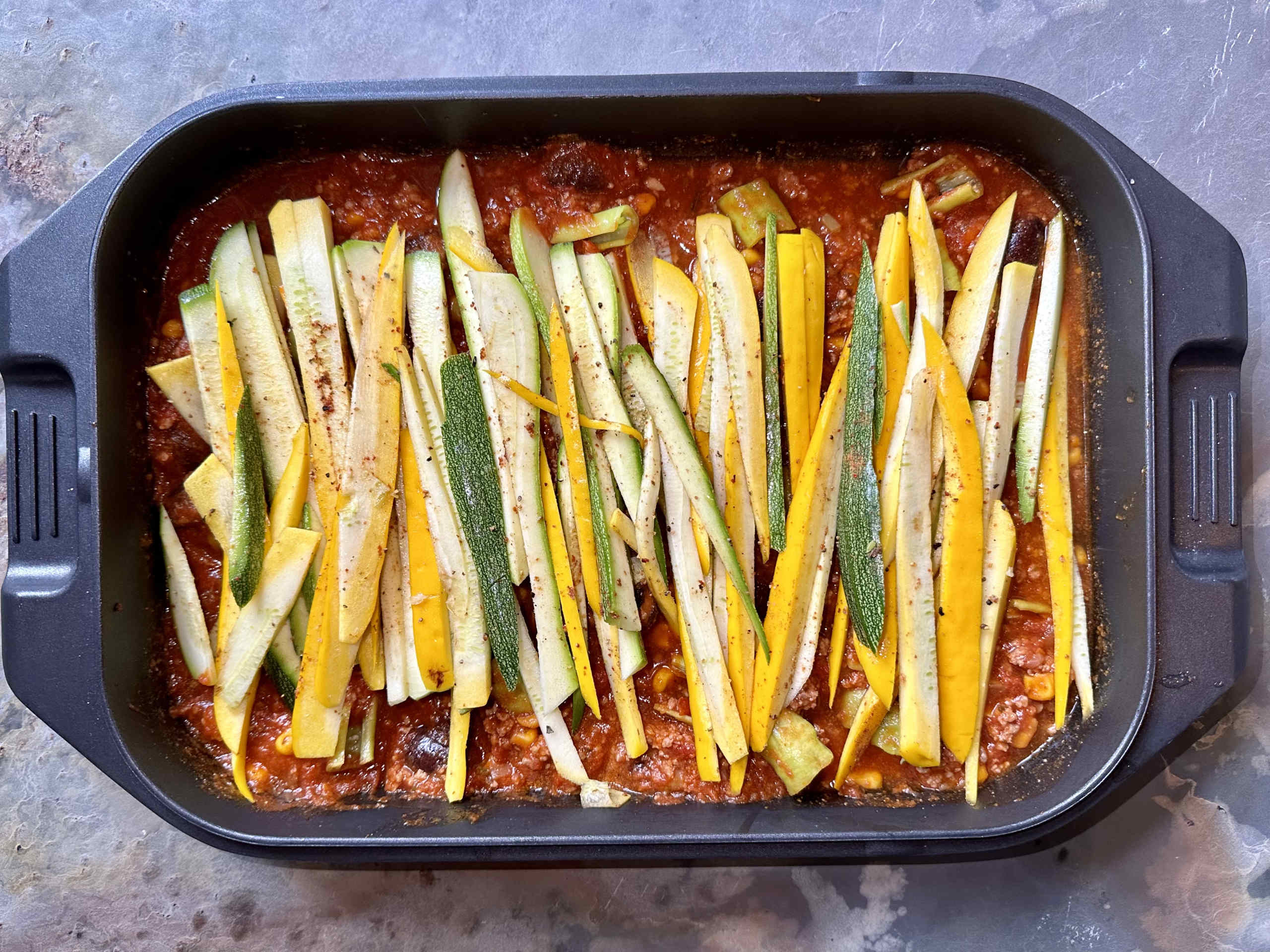Courgettes on tomato sauce